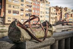 "Versatile and stylish, this handmade waxed canvas duffle bag is a timeless classic travel essential. An antique brass zipper and copper-brass accents give this duffle just enough styling to stand out while still maintaining its clean, simple aesthetics. We love those materials because of the life they get over time is forever not for just now. Each handmade piece of work is as unique as each person in the world... and there's no need for an upgrade if it's already perfect. FEATURES: * Made with Rectangular Waxed Canvas Duffle Bag For Daily Use, Everyday Waxed Canvas Rectangular Duffle Bag, Everyday Rectangular Waxed Canvas Duffle Bag, Rugged Duck Canvas Travel Bag, Rectangular Waxed Duffle Bag For Overnight Trips, Rugged Travel Bag With Leather Patch, Rectangular Waxed Finish Duffle Bag For Overnight Trips, Large Capacity Waxed Canvas Duffle Bag, Outdoor Waxed Canvas Weekender Bag With Waxed Finish