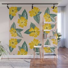 a wall mural with yellow flowers and green leaves