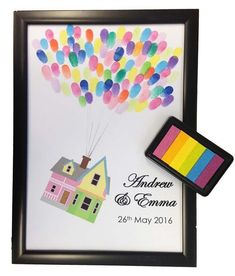 a photo frame with a house and balloons on it