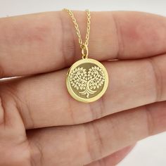 Tree Necklace, 14K Solid Gold Pendant, Tree of Life Charm, Family Tree Necklace, Engraved Tree Pendant, Tree Jewelry, Engraved Disc Charm 14 Material of pendant: Solid gold 14k ♣ Metal Stamp: 14k ♣The pendant is available in 3 sizes: 12.7 / 0,50 inches ( Diameter ) 15.2 mm / 0,60 inches ( Diameter ) 19,1 mm / 0,75 inches ( Diameter ) ( In the photos the size of the pendant is 15mm / 0.55 inches Diameter ) ♣ Material of chain: Solid gold 14k  Chain Length: ♥40 cm / 15,75 inches ( Length ) ♥45 cm / 17,72 inches ( Length ) ♥50 cm / 19,68 inches ( Length ) ♥ 55 cm / 21,65 inches ( Length ) Pendant thickness : 0.55mm Inner diameter of jump ring : 4mm Tree Jewelry, Family Tree Necklace, Tree Necklace, Jewelry Tree, Tree Pendant, Metal Stamping, Family Tree, Tree Of Life, Gold Pendant