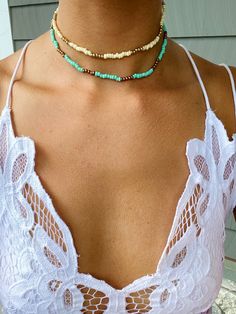 now waterproof! beach vibes for sure! these new chokers are so fun and perfect for casual summertime looks. available in blue, green and white. fun alone or layered with your other faves! -1 boho beaded choker in your choice of white, green, blue or pink (stainless steel beads) every piece of jewelry is handcrafted and/or assembled at bubs & sass. we pay a lot of attention to detail and want our customers to be happy! please reach out if we haven't accomplished this. all of our products are nick Blue Tiny Beads Choker For Summer, Turquoise Choker With Round Beads For Summer, Summer Turquoise Choker With Colorful Beads, White Choker With Colorful Beads For Vacation, White Beaded Choker For Vacation, Bohemian Beaded Choker For Beach, Bohemian Beaded Choker For Vacation, Casual Tiny Beads Jewelry For Summer, Casual Summer Jewelry With Tiny Beads