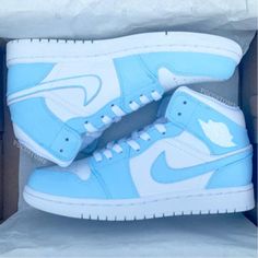 The Baby Blue Custom Air Jordan 1 is a unique spin on a classic silhouette. Featuring a baby blue colorway, this shoes bring a fresh and modern aesthetic to any outfit. With its iconic Jordan design, this custom shoe adds style and attitude to any look. iends, family, that special someone, or yourself ✨ - Exactly as shown in the pictures. - Brand New & Authentic. 💯  - Hand Painted with attention to detail. 👨‍🎨  - Waterproof and Flexible. ❤️  - Unisex model. Please refer to the Size Chart. Air Jordan 1 Custom, Jordan 1 Custom, Jordan Design, Blue Air Jordan 1, Custom Air Jordan 1, Nike Shoes Women Fashion, Pretty Sneakers, Nike Fashion Shoes, Preppy Shoes