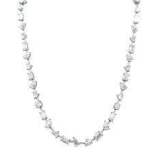 This stunning 18k Twt 14.99 Mix Shapes All Around Diamond Necklace is crafted from 18k white gold, boasting a whopping total of 14.99 carats of stunning diamonds in a variety of shapes. This necklace makes a beautiful statement, ideal for special occasions. DIAMOND 15.00 MIX SHAPE TCW 52 PCS. E-G VVS1-VS1 18K WG 19.65 GRAMS SIZE 15" NS-1727 Pear-shaped Baguette Diamond Jewelry, White Cubic Zirconia Diamond Necklace With Baguette Diamonds, Baguette Cut Diamond Necklace In Platinum For Wedding, Platinum Baguette Cut Diamond Necklace For Wedding, Baguette Cut Platinum Diamond Necklace For Wedding, Platinum Necklace In Baguette Cut Diamond White, Luxury Pear-shaped Jewelry With Baguette Diamonds, White Baguette Cut Diamond Necklace, White Gold Cubic Zirconia Diamond Necklace In Baguette Cut