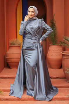 Introducing our stunning Sparkling Evening Dress Hijab, designed exclusively for the modern, modest woman. Available in elegant green and blue shades, this evening dress features exquisite embroidery that adds a touch of glamour to any special occasion. Perfect for engagements, proms, or elegant soirées, it combines style and modesty seamlessly. The maxi design provides graceful coverage while allowing you to feel confident and beautiful. Crafted from high-quality Islamic cloth, this dress ensur Festive Evening Fitted Abaya, Festive Elegant Long Abaya, Elegant Fitted Abaya For Festive Occasions, Elegant Fitted Abaya For Festive Season, Elegant Fitted Festive Abaya, Festive Elegant Fitted Abaya, Festive Elegant Long Dress Abaya, Eid Evening Floor-length Gown, Floor-length Evening Gown For Eid