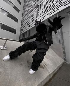 a man in black jacket and white shoes on skateboard