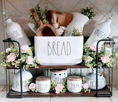 a shelf filled with bread and other kitchen items