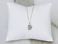 This 100% natural raw aquamarine stone necklace would be a perfect birthday gift for a March birthday or a bridesmaid, Mom, or any loved one. The aquamarine stone represents tranquility, serenity, clarity, and harmony. You can also add more birthstone stones to this necklace to represent each family member. Click here for the cascade version: https://www.etsy.com/listing/1056765229/raw-stone-necklace-custom-birthstone?ref=shop_home_active_1&pro=1&frs=1Choose from a plated chain or an 18k Delicate Charm Necklaces With Natural Stones For Gift, Delicate Charm Necklace With Natural Stones For Gifts, Delicate Natural Stones Charm Necklace For Gift, Dainty Silver Birthstone Crystal Necklace, Minimalist Amazonite Jewelry Gift, Minimalist Aquamarine Jewelry For Gift, Minimalist Aquamarine Jewelry Gift, Handmade Amazonite Crystal Necklace Gift, Amazonite Pendant Necklace For Gift