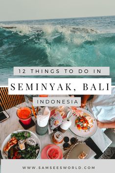 some food and drinks on a table in front of the ocean with text overlay saying 12 things to do in semyyak, bali