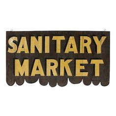 a wooden sign that says sanitary market on it