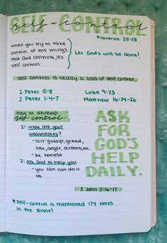 an open notebook with handwritten instructions on the page in green and white ink that reads self - control