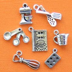 Baking themed collection of antique silver tone charms, in a zinc alloy metal. Perfect for bracelets, pendants, earrings, zipper pulls, bookmarks and key chains!Measurements: 10mm - 30mmHole Size: 2mmYou will receive 1 set of 7 charms.PLEASE NOTE: From time to time I may need to substitute one of the charms for another of equal or greater value... all keeping with the theme of the collection.Need more? Just send us a message through the contact us form, instant chat, or at mailto:info@bohemianfi Charm Collection, Metal Charms, Jewelry Making Charms, Wine Charms, Metal Charm, E Bay, Sterling Silver Charm, Silver Charms, Charm Jewelry