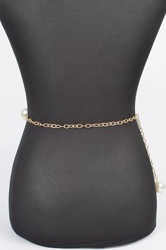 Elevate your outfit with our Iconic Pearl Station Chain Belt. Indulge in the luxury of genuine pearls and a delicate chain, adding a touch of elegance to any look. Complete your wardrobe with this timeless and sophisticated accessory. One Size Width - 1.25" Length - 50" PVC, Faux Pearl, Mix Metal Lead & Nickel Compliant Pearl White Chain Pearl Necklace For Party, Pearl White Necklace With Chain For Party, Pearl White Pearl Necklace With Chain For Party, Chic White Chain Necklace For Formal Events, Chic White Chain Necklace For Formal Occasions, Chic Pearl Necklace With Adjustable Chain, Elegant Pearl Necklace With Chain, Elegant Pearl Necklace With Chain For Wedding, Chic Formal Pearl Chain Necklace