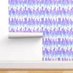 the wallpaper is purple and blue with white dots