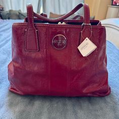 Coach - Red Handbag - Nwt New With Tags Designer Burgundy Shopping Bag, Designer Burgundy Bag For Shopping, Designer Red Tote Bag, Designer Red Bags For Errands, Designer Burgundy Tote Bag, Classic Red Shoulder Bag With Top Carry Handle, Classic Red Shoulder Bag With Top Handle, Designer Red Bag For Everyday Use, Rectangular Burgundy Bags With Branded Hardware