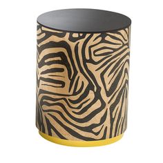 a black and yellow vase with zebra print on it