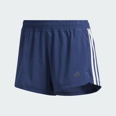 NWT Women's Adidas 3 Stripes Athletic Training Shorts FJ7136 INDIGO BLUE PACER 3-STRIPES WOVEN SHORTS SOFT, STRETCHY MID-RISE SHORTS MADE TO MANAGE MOISTURE. Get a distraction-free workout in these soft mid-rise shorts. Made with moisture-wicking fabric, the shorts have a bit of stretch and are cut close to the body for a slim, modern fit. A slightly longer length in back provides extra coverage. SPECIFICATIONS Slim fit is cut close to the body Mid rise Longer back hem 73% polyester / 27% recycl Blue Striped Sporty Athletic Shorts, Blue Compressive Functional Athletic Shorts, Blue Compressive Athletic Shorts Sportswear, Sporty 4-way Stretch Blue Athletic Shorts, Adidas 3 Stripes, Adidas Blue Athletic Shorts With Built-in Liner, Free Workout, Athletic Training, Mid Rise Shorts