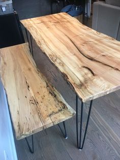 two tables made out of wood with hairpin legs