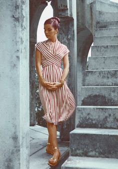 1946 Model is wearing a striped wrapped Empire dress of rayon jersey by Mildred Orrick. 50s Clothing, Vintage Summer Dresses, Clothing Casual, Empire Dress, Old Fashion