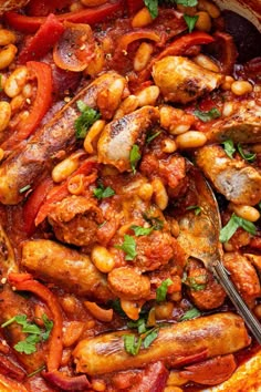 a bowl filled with beans, meat and veggies