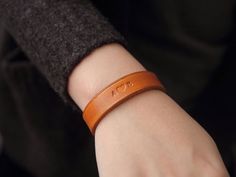 "Simple genuine leather band for him or her, Customized Bracelet, Personalized Bracelet for that special someone ★ Features: ★ ► Bracelets can be engraved on outside only  ► 7 beautiful colors to choose ,select one of the options below the title. ► 5 sizes: small, medium, large, x-large, 2x-large    ►  ( 1.5cm ) 0.6\" wide ★ Sizing:  ★ ► Small bracelets fit wrist diameters of 14cm or 5.5\" (Average Child wrist) ► Medium bracelets fit wrist diameters of 16cm or 6.25\" (Small Woman's wrist) ► Larg Classic Leather Bracelet With Leather Strap As Gift, Classic Leather Strap Bracelet As A Gift, Leather Wristband Gift, Classic Wristband Gift, Classic Leather Bracelet Gift, Classic Adjustable Wristband As Gift, Classic Leather Bracelet As A Gift, Hand Stamped Brown Leather Bracelet Gift, Leather Strap Wristband As Gift