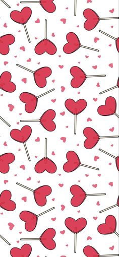 red hearts and lollipops on a white background seamless wallpaper pattern