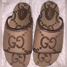 Brand New Never Worn Authentic Comes On Original Ships Next Day Designer Slides With Leather Sole, Gucci Luxury Sandals With Leather Sole, Gucci Open Toe Mules With Branded Heel Counter, Gucci Luxury Open Toe Mules, Luxury Brown Slides With Round Toe, Designer Open Toe Mules With Branded Insole, Gucci Luxury Sandals With Branded Insole, Luxury Beige Slides For Spring, Designer Brown Flat Slides