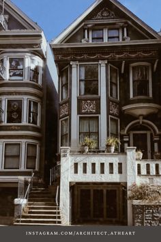 an old victorian style house with many windows and balconies