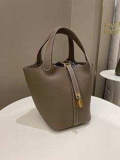 Hermes Picotin Lock PM 18Etoupe Clemence GHWB StampMay 2023NewIncludes full set box, dust bag, lock, keys and receiptPrice now 6100 sgd 4550 usd CN5022-12 Hermes Pitocin, Hermes Picotin Etoupe, Designer Bags 2024, Hermes Picotin Outfit, Hermes Bags Picotin, Hermes Wishlist, Hermes Picotin, Bag Lock, Basic Fashion