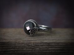 This ring is one of a kind. The ring was designed and handmade in my metalsmith shop.  SIZE: 9 US/CA GEMSTONES: onyx  METAL: Sterling and fine silver Please message me if you have any questions. Thanks for shopping in my little storefront!  -Farrah, silversmith and owner of Arachne Jewels  Returns/exchanges are not accepted on custom, made-to-order, or finished-to-order items. Returns/exchanges of ready-to-ship items are accepted within 7 days of delivery. A refund will be processed once the item is returned, minus shipping costs. ** A note regarding shipping: I will do all I can to ensure your package arrives on time, I am not responsible for shipping delays caused by carriers or natural disasters. Once the package has left my hands, there's nothing I can do to speed up your shipping. If Hand Forged Black Rings, Womens Silver Jewelry, Halloween Spider Web, Spider Web, Natural Disasters, Fine Silver, Rings Statement, Black Onyx, Women's Jewelry