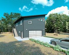 a car is parked in front of a two - story house with a driveway and garage