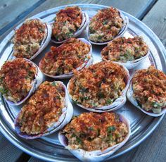 an assortment of stuffed shells on a metal tray