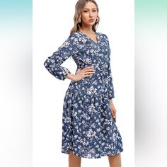 Gorgeous Floral Drop Waist Dress With V-Neck And Long Sleeves. This Year Florals Are A Huge Trend! A Floral With A Boho Vibe And You Are On Point For Summer/ Fall 2023! It Has A Cinch Waist For Perfect Fit, And Falls Mid Calf.. It Is Cotton Rich- So You Will Stay Cool And Comfy. Easy Breezy Wear And It Is Stunning.. 65% Cotton/ 35% Poly. Blue Floral V-neck Dress For Vacation, Blue Long Sleeve V-neck Dress For Spring, Elegant Blue Floral Print V-neck Dress, Blue Floral V-neck Dress For Spring, Blue V-neck Floral Dress For Spring, Casual Blue Flowy V-neck Dress, Blue Floral Print V-neck Dress, Blue Flowy V-neck Floral Dress, Blue Flowy Midi Dress With Surplice Neckline