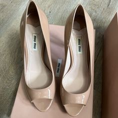 Only Worn Once! Nearly Brand New Condition. I Fit A True Size 8.5 But They Were Tight On Me. Comes With Box. 100% Authentic. Open Toe Court Shoes With Branded Heel Counter, Open Toe Patent Leather Court Shoes With Padded Heel, Chic Open Toe Court Shoes, Spring Almond Toe Patent Leather Heels, Miu Miu Heels With Padded Heel For Spring, Miu Miu Heels With Heel Strap For Spring, Miu Miu Round Toe Heels For Summer, Beige Open Toe Court Shoes For Evening, Designer Heels Medium Width For Spring