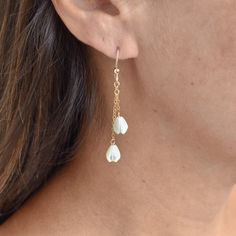 These earrings sway with your every movement and are very flattering! Two carved mother of pearl Pikake beads dangle gently from your choice of sterling silver or gold fill chain. This material will not tarnish and can even get wet! White Dainty Drop Threader Earrings, Delicate White Threader Earrings, Dainty White Linear Single Earring, White Delicate Long Drop Jewelry, Delicate White Long Drop Jewelry, Delicate Dangling Charms Earrings, White Dangle Threader Earrings For Everyday, Delicate White Threader Earrings For Gift, Delicate White Threader Earrings As Gift