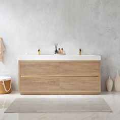 a bathroom with a sink, mirror and rug