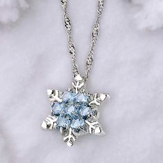 Add A Touch Of Winter Wonderland To Your Everyday Style With This Stunning Women's Stainless Steel And Blue Crystal Snowflake Charm Necklace. The Delicate Round Link Chain Features A Charming Lobster Closure And An Adjustable Length To Suit Your Preferred Style. The Pendant/Locket Type Is A Beautiful Charm Showcasing A Sparkling Blue Crystal At The Center Shaped Like A Snowflake. Perfect For Christmas Or Winter Occasions, This Necklace Is Made Of High-Quality Materials Including Stainless Steel Snowflake Necklace Silver, Elegant Blue Crystal Pendant Necklace, Elegant Snowflake Pendant Necklace For Gifts, Blue Snowflake Sterling Silver Necklace, Snow Flake Pendant Necklaces, Pendant Locket, Spiral Necklace, Crystal Snowflakes, Black Bead Necklace