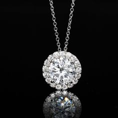 Ross-Simons - 2.00ct t. w. Lab Grown Diamond Halo Pendant Necklace in 14kt White Gold. 18". Indulge in big, beautiful sparkle for a nice price! Our fabulous pendant necklace features a stunning 1.70 carat round brilliant-cut lab-grown diamond center with a bright border of .30 ct. t. w. round brilliant-cut lab-grown diamonds all around. Crafted in polished 14kt white gold and suspended from a cable chain with a 2" extender. Lab-grown diamonds are identical to mined diamonds according to their op Luxury Gia Certified White Gold Diamond Necklace, Dazzling Platinum Necklace With Brilliant Cut, Gia Certified Luxury Round Necklace, Luxury Platinum Necklace Gia Certified, Exquisite Gia Certified Diamond Necklace, Luxury Gia Certified Platinum Necklace, Gia Certified Round Diamond Necklace In Luxury Style, Gia Certified Luxury Round Diamond Necklace, Dazzling Diamond Necklace With Halo Setting