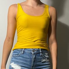 Very Soft Yellow Tank Top. Never Worn Yellow Fitted Tops For Everyday, Plain Yellow Top For Spring, Fitted Yellow Tops For Everyday, Fitted Neon Yellow Casual Tops, Trendy Yellow Tank Top, Casual Yellow Cotton Tank Top, Yellow Fitted Casual Tank Top, Yellow Summer Tops For Everyday, Casual Yellow Sleeveless Tank Top