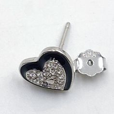 2 Pieces/1 Pair per order of CZ Micro Pave Heart Stud Earrings, Aqua, Pink or Black 925 Sterling Silver **SPECIFICATIONS** Measurements Approximately: 10 x 9 mm Holes: N/A Stones: Cubic Zirconia Quantity of Items: 2 piece unless otherwise selected Materials: Copper base Conversion in MM: US Dime 18 mm; US Nickel is 21.5 mm; US Quarter is 24 mm; 1 inch = 25.4 mm We welcome all custom orders or wholesale bulk orders. If you are unsure on an item, please message us and we will answer promptly. All Silver Heart Earrings, Mother Jewelry, Heart Stud Earrings, Heart Studs, Heart Earrings Studs, Silver Enamel, Micro Pave, Heart Earrings, Silver Heart