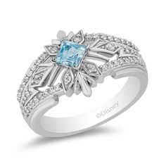 This ring from Enchanted Disney Fine Jewelry is created with an abundance of style, brilliance, and personality. Exuding Queen Elsa's charm, this sterling silver Elsa Snowflake Ring manifests the Queen of Arendelle's poised and reserved beauty. It features an icy blue aquamarine gemstone in the center of a diamond-adorned geometric snowflake design. The diamonds are 1/4ctw, I in color, and I2 in clarity. This ring measures 13mm in width across the top and 2.5mm at the bottom. Born with the power Disney Silver Jewelry For Anniversary, Elsa Snowflake, Geometric Snowflake, Snowflake Ring, Enchanted Disney, Enchanted Disney Fine Jewelry, Disney Fine Jewelry, Princess Elsa, Queen Elsa