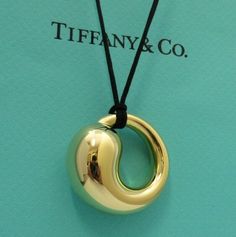 TIFFANY & Co. Elsa Peretti 18K Gold 35mm Eternal Circle Pendant Necklace XL | eBay Tiffany Ring Necklace, Tiffany Necklaces, Bean Necklace, Tiffany Necklace, Elsa Peretti, Circle Pendant Necklace, Silk Cord, Circle Pendant, Black Silk