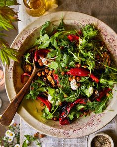 a salad in a bowl on top of a table