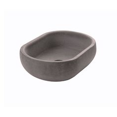 the bowl is made out of concrete and has a rounded shape in grey, on a white background