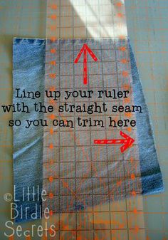 a piece of fabric with an arrow pointing to the right and another line up your ruler with the straight seam so you can trim here