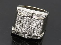 925 Sterling Silver - Vintage Cubic Zirconia Encrusted Band Ring Sz 10 - RG19698  925 Sterling Silver - Vintage Cubic Zirconia Encrusted Band Ring Sz 10 - RG19698  Jewelry Type:         Ring  Metal Type:            925 Silver  Metal Size:             10 Finger  Stone Type:            Cubic Zirconia  Condition:              N/A  Jewelry Weight:     17.7 Grams  PLEASE NOTE: THIS ITEM IS PRE-OWNED. ALTHOUGH MOST ITEMS ARE IN VERY GOOD CONDITION, SOME MAY NEED CLEANING AND/OR MINOR REPAIRS. WE MAKE Elegant Iced Out Diamond Ring For Formal Occasions, Formal White Gold Rings With Rhinestones, Elegant Iced Out Diamond White Rings, Classic Silver Ring With Bling, Classic Silver Rings With Bling, Silver Sterling Silver Ring With Rhinestones, Formal Sterling Silver Rings With Rhinestones, Classic Silver Diamond Ring With Bling, Silver Rings With Rhinestones Fine Jewelry