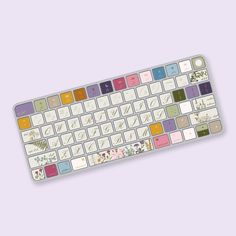 a computer keyboard with many different colored keys