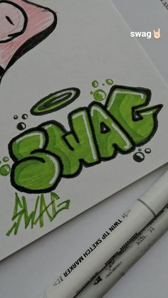 the word swag is drawn on paper with markers