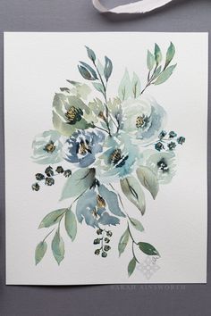 a watercolor painting of blue flowers and green leaves on a white card with ribbon