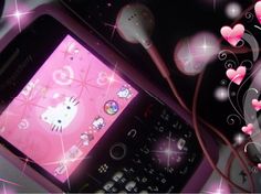 a cell phone with hello kitty on the screen and hearts coming out of its display