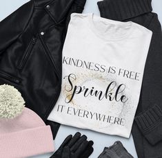 Spread positivity wherever you go with our "Kindness is Free, Sprinkle It Everywhere" T-Shirt! This uplifting tee is perfect for those who believe in the power of kindness and want to share that message with the world. With its heartwarming message, it's ideal for wearing to community events, casual outings, or simply as a daily reminder to make the world a little brighter. Made from a soft, premium cotton blend, this shirt offers a comfortable fit that you'll love to wear all day long. Available in a variety of sizes, it makes a thoughtful gift for anyone who values compassion and spreading good vibes. Product features - Structural support with side seams - Elastic ribbed knit collar with seam - Stabilizing shoulder tape - Versatile lightweight fabric - Stylish retail fit and V-neckline C Kindness Is Free, Power Of Kindness, Positive Shirt, Spread Positivity, Spread Kindness, Free Tshirt, Community Events, Daily Reminder, Be Kind